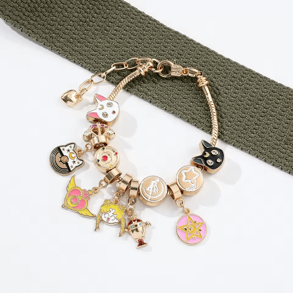 Gold-plated Sailor Moon charm bracelet with adjustable chain