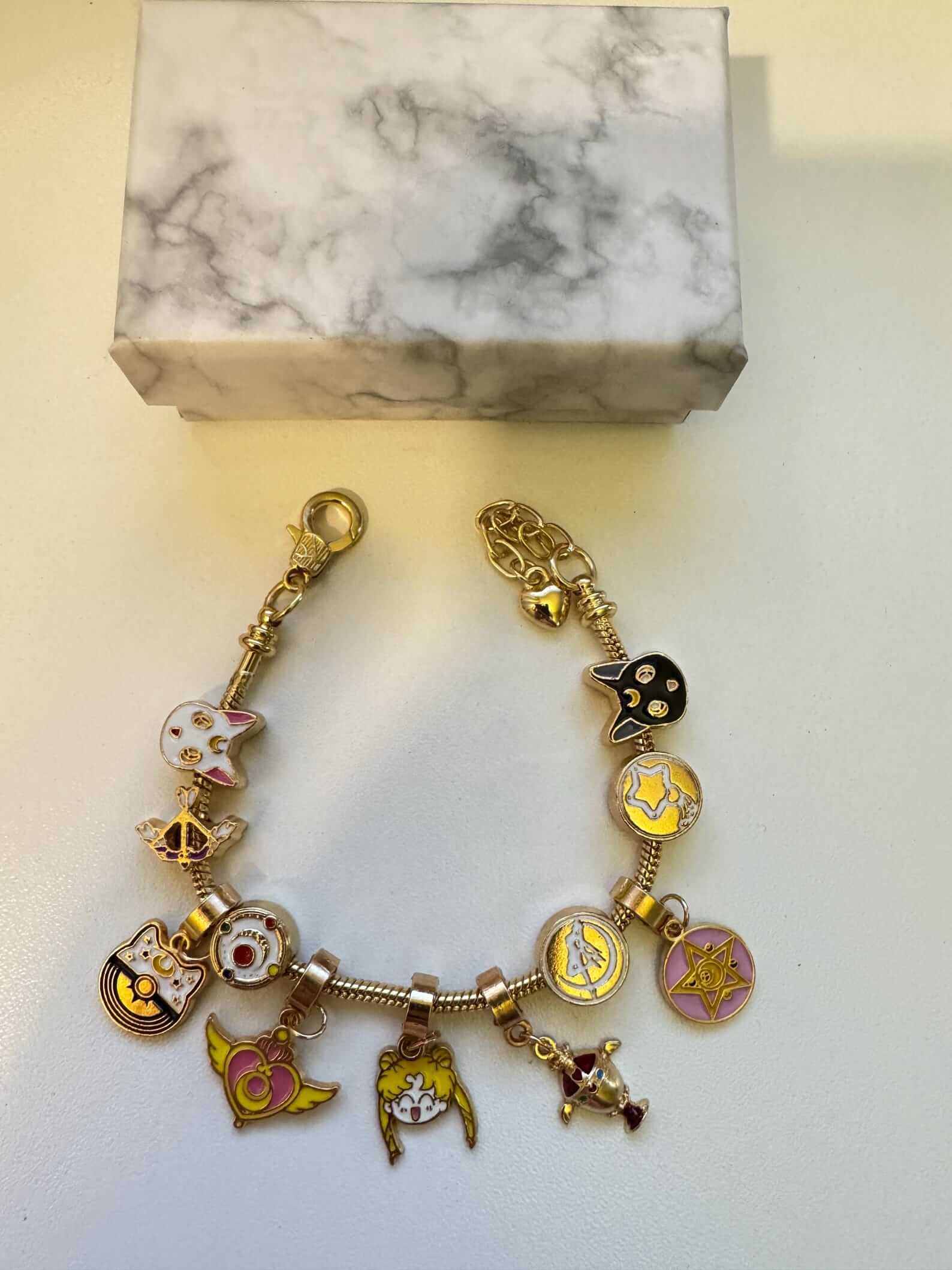 Kawaii Sailor Moon bracelet with moon and star charms